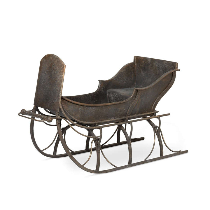 Vintage-inspired Antique Iron Cutter Sleigh Christmas Décor for classic winter charm
