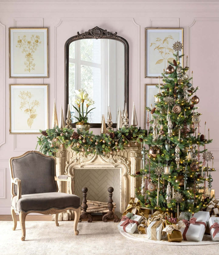 Elegant antique white fireplace mantel with vintage finish, adorned with garlands and Christmas decor, beside a richly decorated tree.