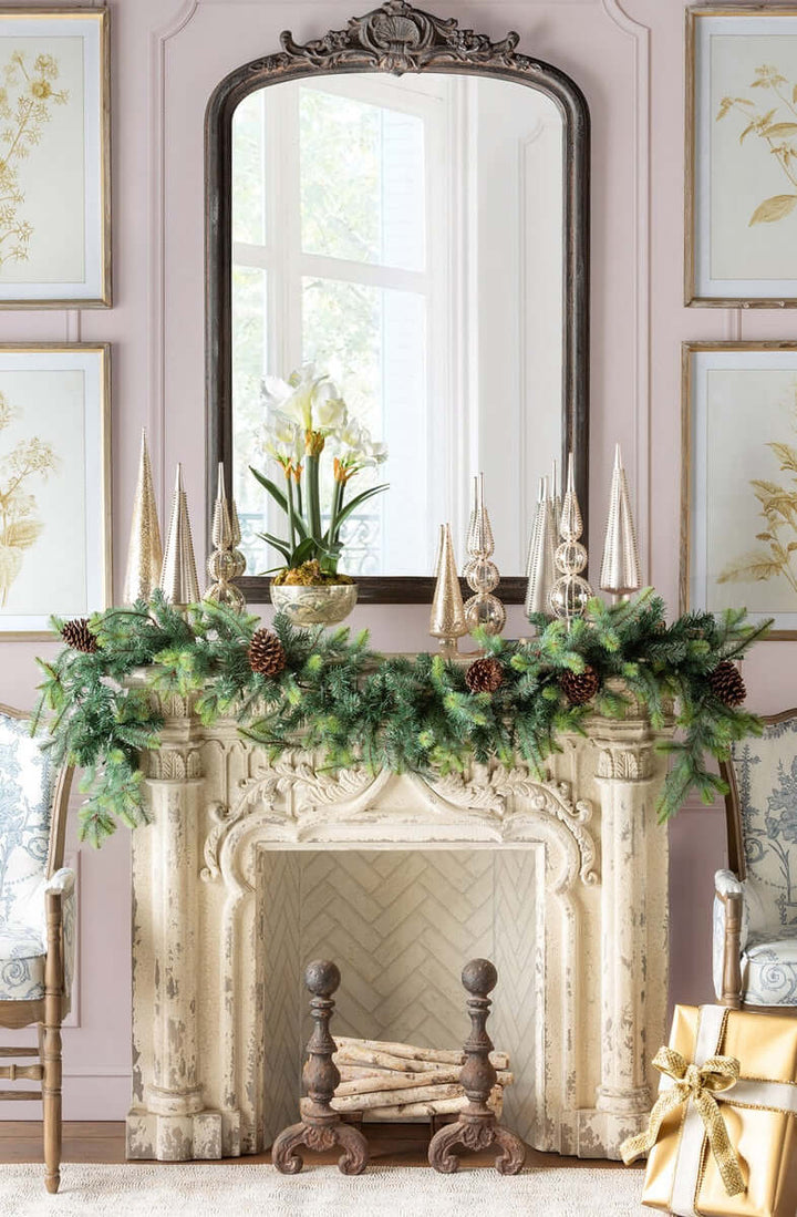 Antique white fireplace mantel with distressed vintage finish, adorned with holiday decor and mirror, creating a cozy, nostalgic ambiance.