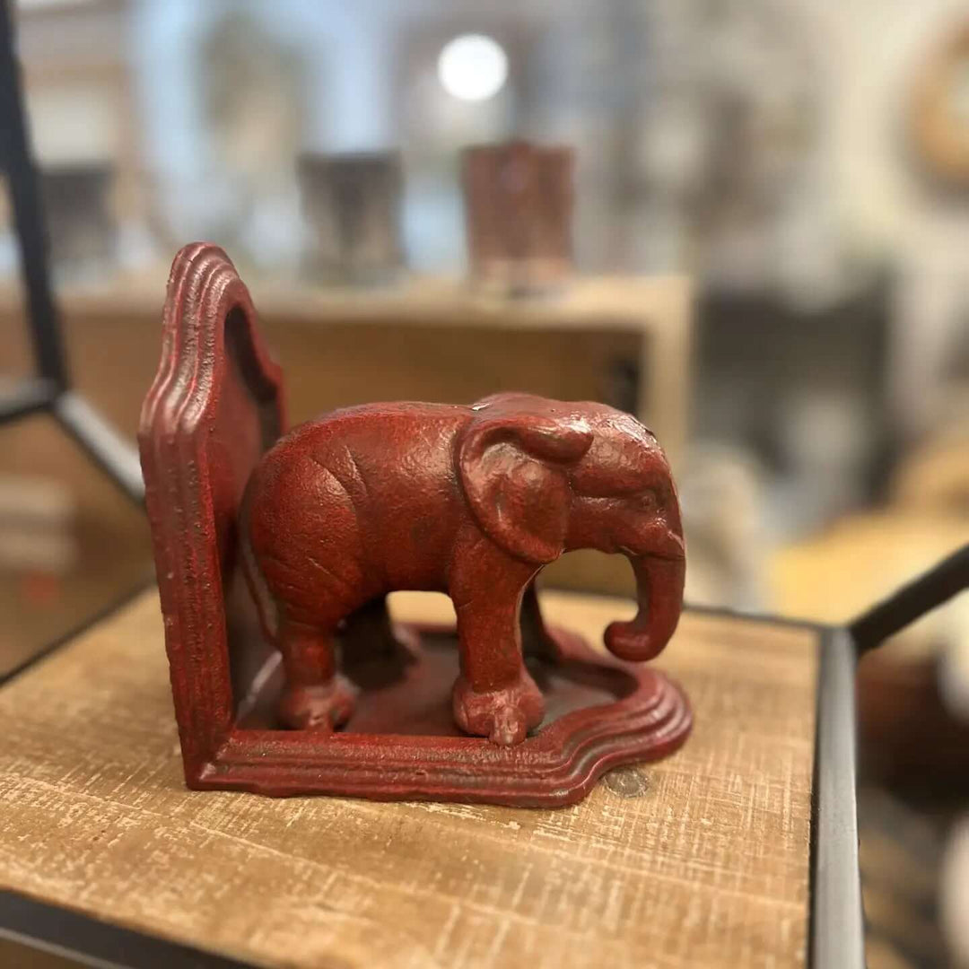 Cast iron elephant bookend in a collected interior