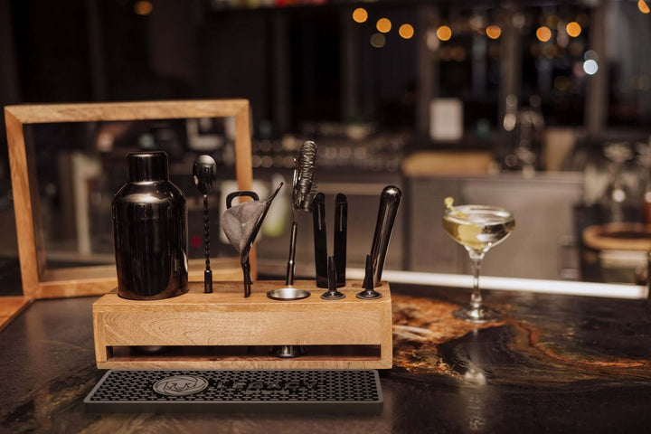 Vintage-Style Bartender Kit with Mango Wood Case & Bar Tools displayed on a bar counter