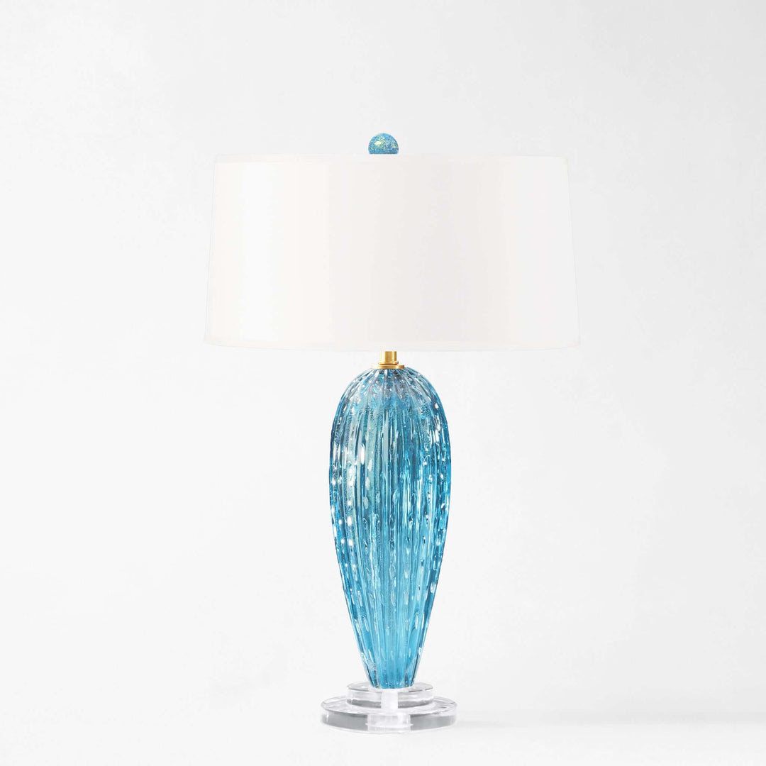 Blue glass table lamp on a white background