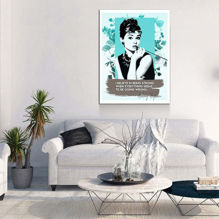 Audrey Hepburn Quote Canvas Wall Art featuring iconic image and empowering text, displayed in a modern living room.