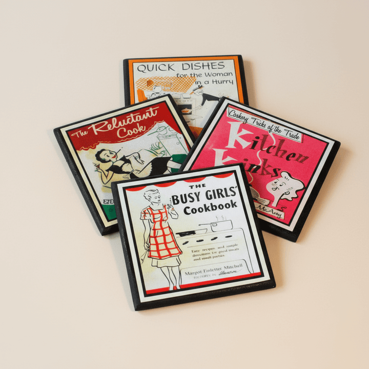 Set of vintage-style cookbook coasters on a beige background