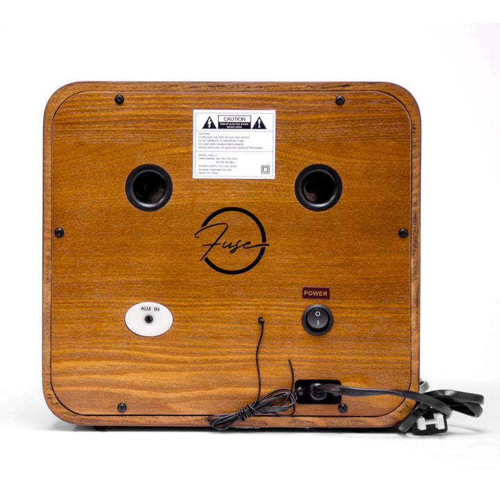 Wooden electronic device with 'Fuse' branding on a white background