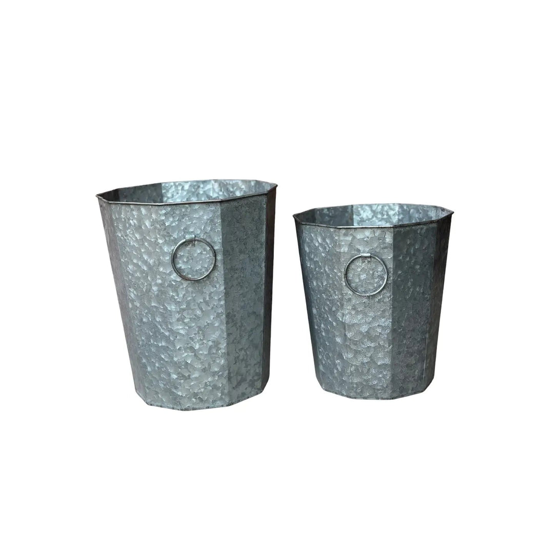 Large and small Beveled Zinc Planters shown together on white