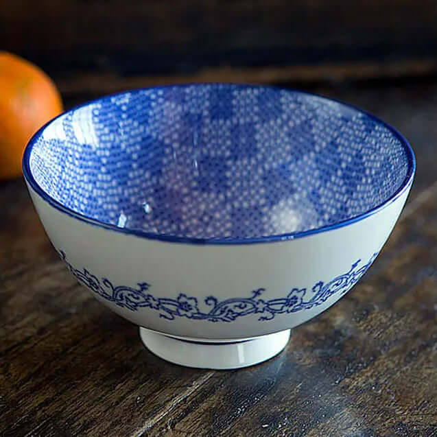 Small blue and white patterned bowl on a tabletop