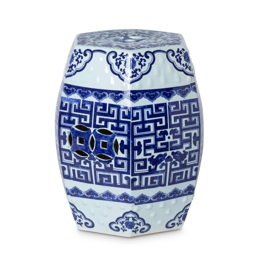 Blue and white Chinoiserie porcelain garden stool with intricate patterns, symbolizing elegance and historical charm.