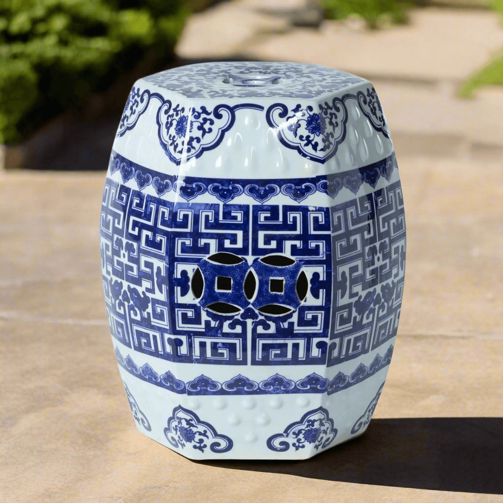 Blue and white Chinoiserie porcelain garden stool with intricate patterns, perfect for adding elegance to any garden or home space.