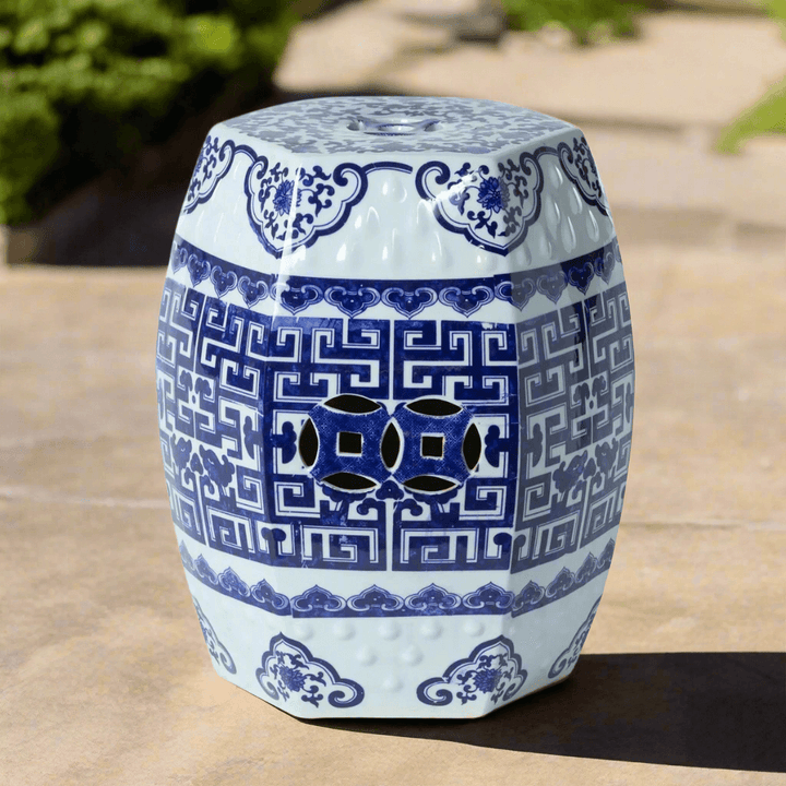 Blue and white Chinoiserie porcelain garden stool with intricate patterns, perfect for adding elegance to any garden or home space.