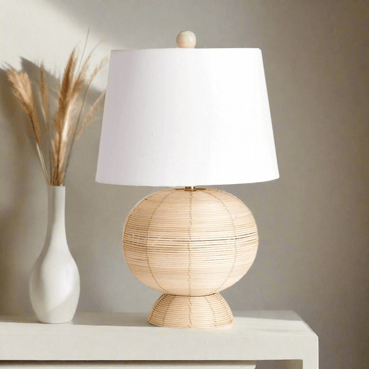 Boho globe rattan lamp with tapered white shade, adding organic charm to any space.