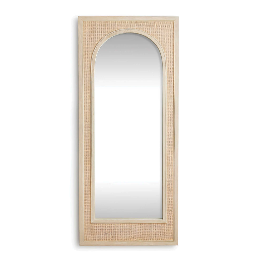 Boho rattan wall mirror in tall arched design, showcasing earthy texture and elegant form.