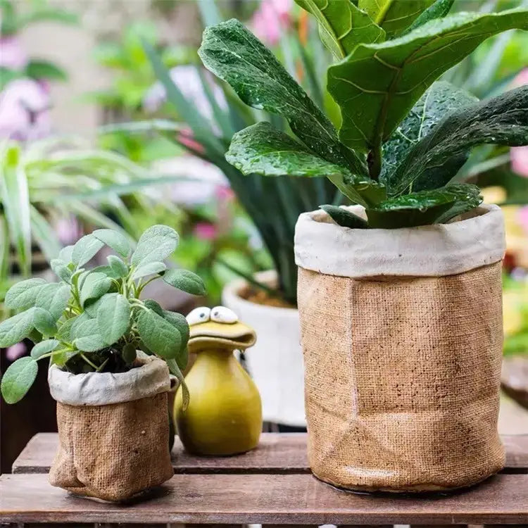 Burlap-Textured Cement Bag Planters styled on stacked books