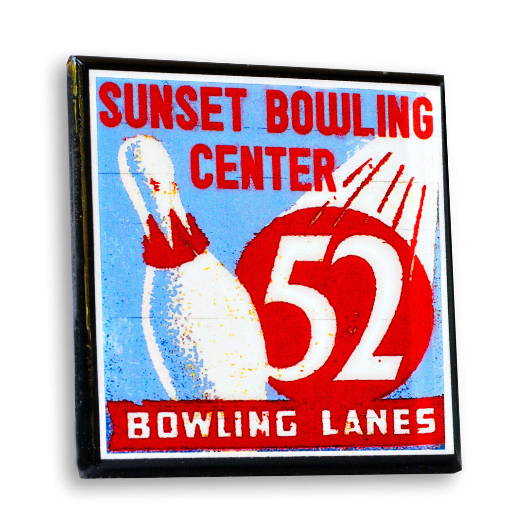 Vintage-style coaster for Sunset Bowling Center with a bowling pin and number 52 on a blue background.