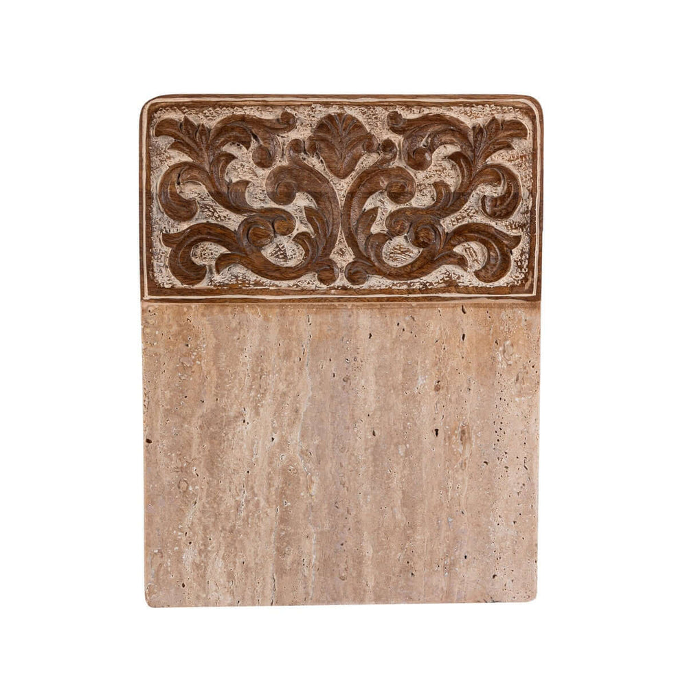 Carved wood and marble cutting board with ornate detailing, showcasing artisanal craftsmanship and timeless design elegance.