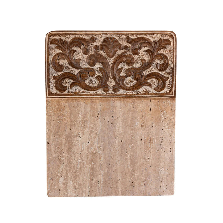 Carved wood and marble cutting board with ornate detailing, showcasing artisanal craftsmanship and timeless design elegance.