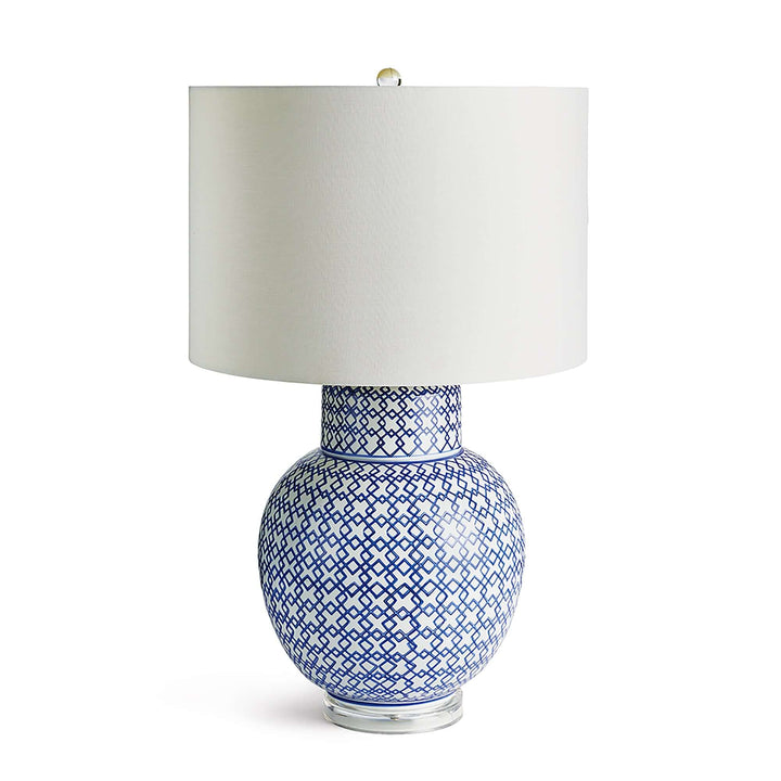 Chinoiserie blue and white ginger jar lamp with a white shade, showcasing classic decorative patterns and elegant form.