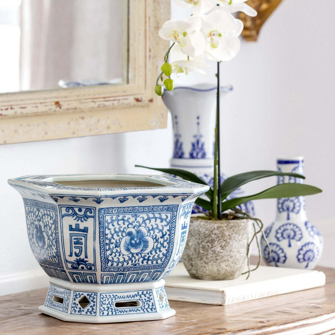 Chinoiserie Blue and White Porcelain Planter with intricate design, showcasing timeless elegance in a home decor setting.