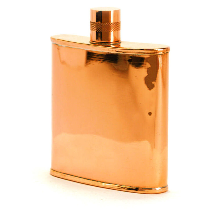 Copper flask on a white background
