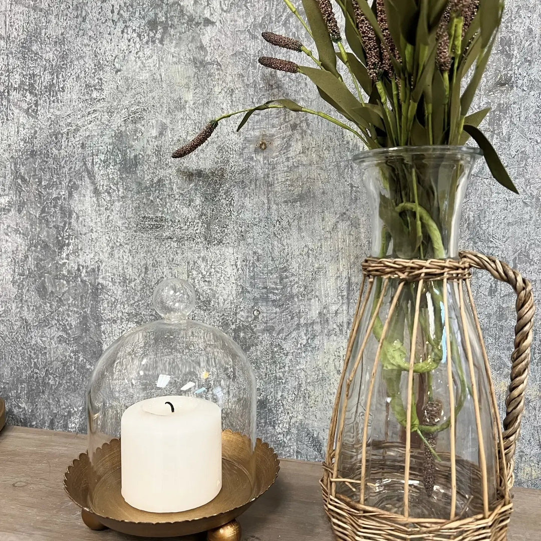 Gold and silver glass cloche candle holders displayed together