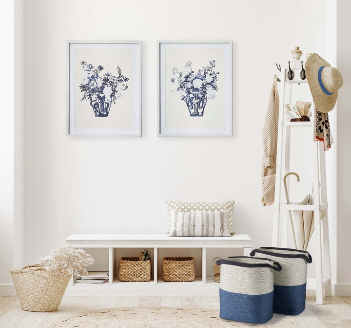 Coastal blue and natural woven storage baskets with handles in a stylish home decor setting.
