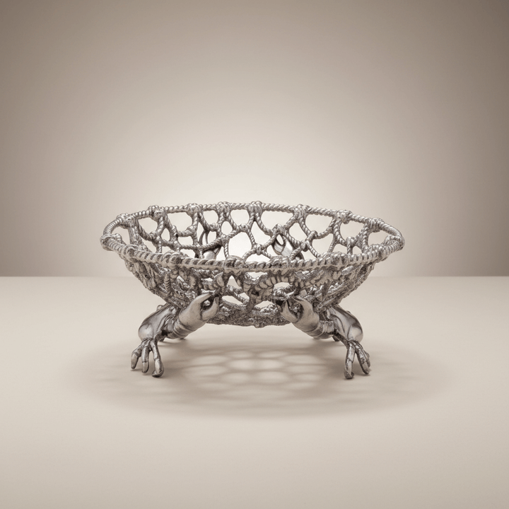 Coastal Crab and Net Fruit Basket made of handcrafted aluminum, embodying maritime elegance and craftsmanship with a crab and net design.
