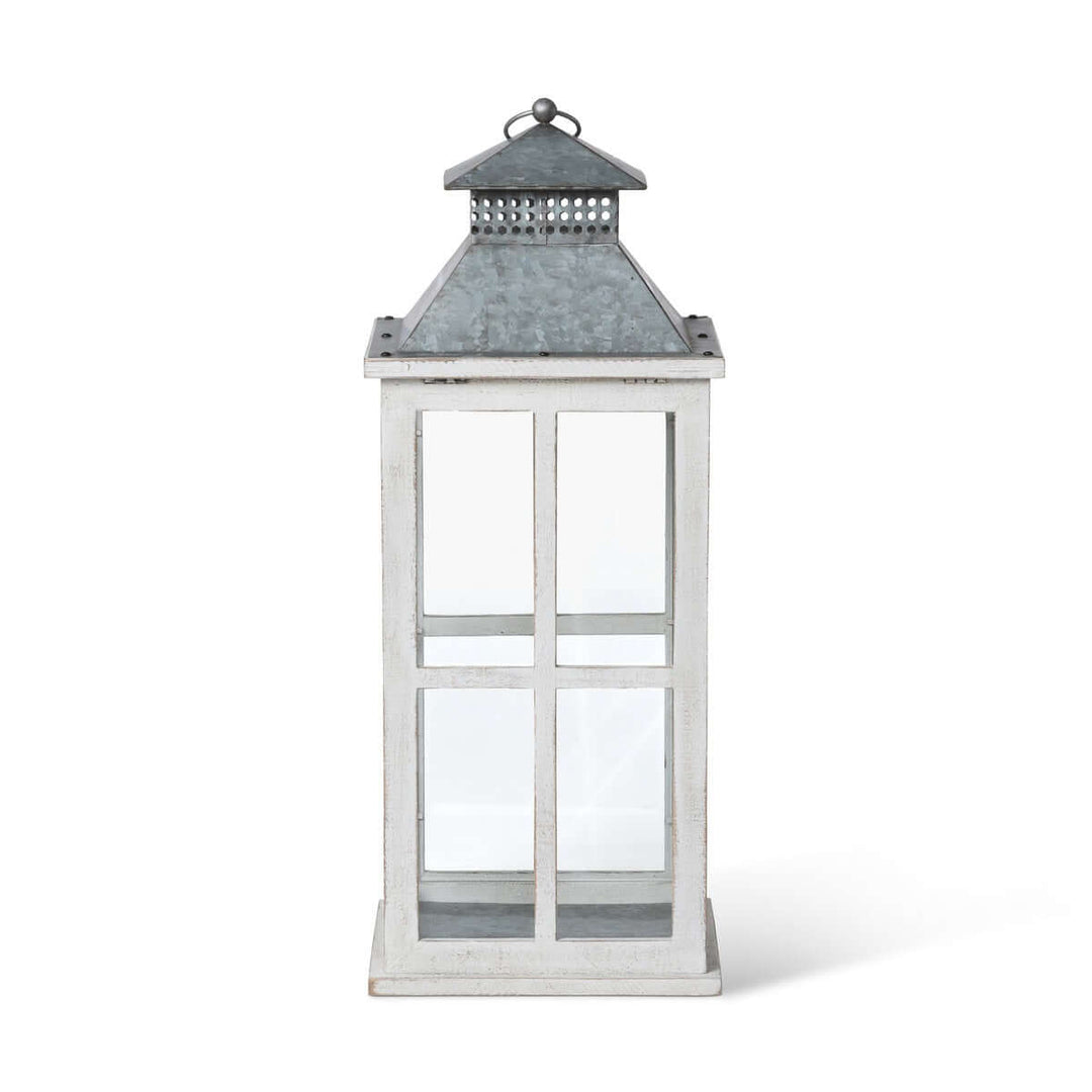 Coastal whitewash wood and glass lantern with galvanized metal top, perfect for seaside décor and nostalgic candlelight ambiance.