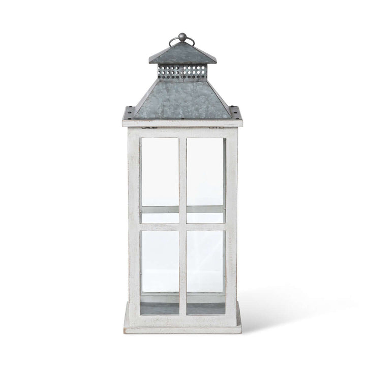 Coastal whitewash wood and glass lantern with galvanized metal top, perfect for seaside décor and nostalgic candlelight ambiance.