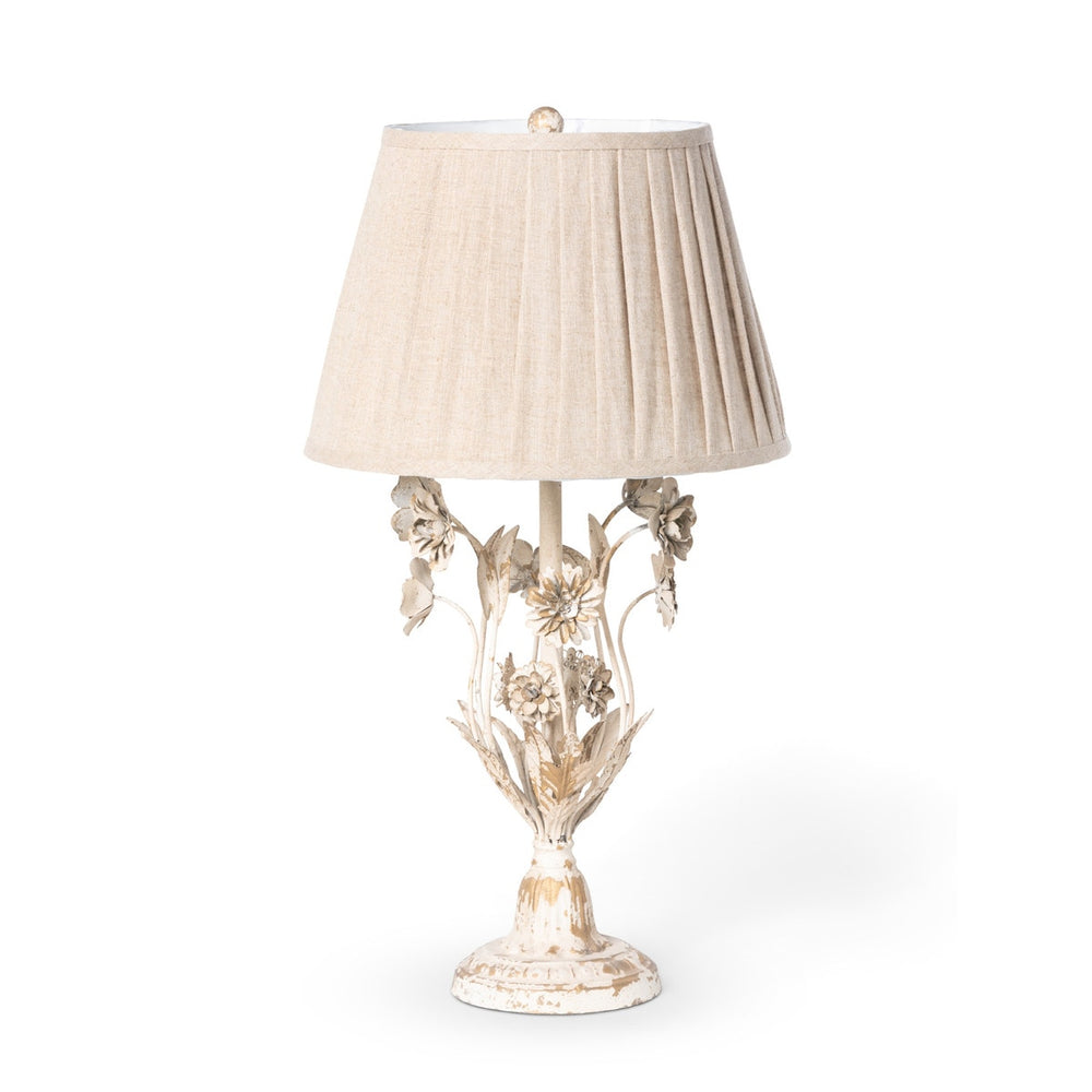 Cottagecore table lamp with vintage floral details; distressed antique white with delicate flower motifs, exuding romantic countryside charm.