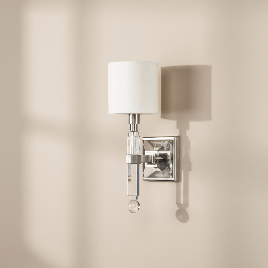 Crystal Wall Sconce with Polished Nickel Trim and Linen Shade against a beige wall
