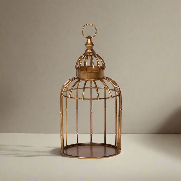 Decorative vintage gold birdcage centerpiece stand with ornate design and domed top for home décor.