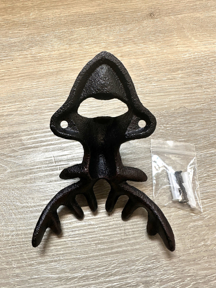Rear view of cast iron deer bottle opener with included mounting screw