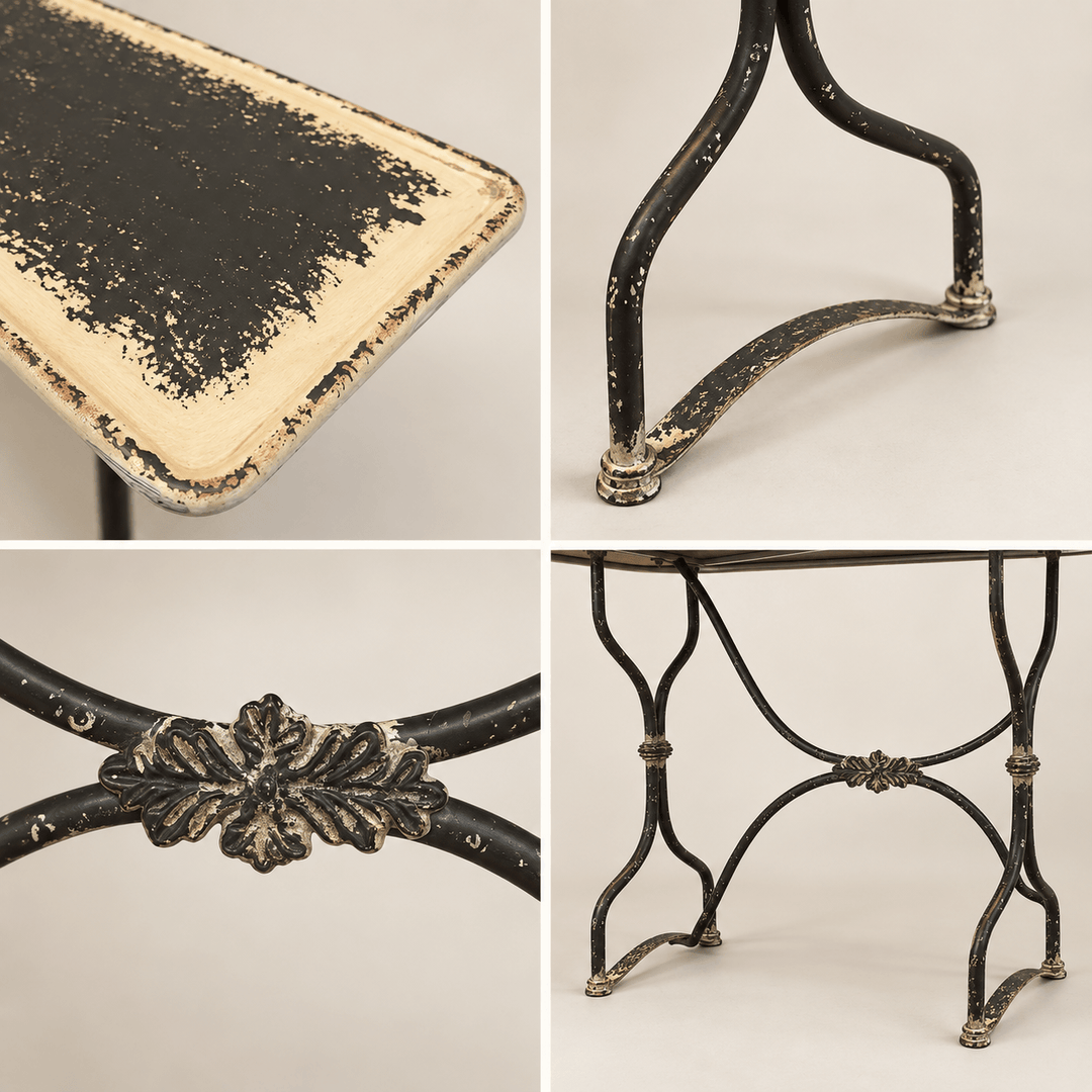 Close details of the Distressed Black and Cream Metal Console Table finish and ironwork