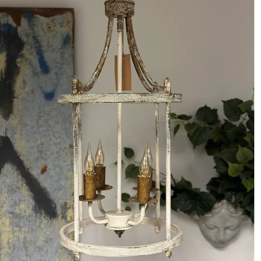 Full round cage pendant with four candle-style light sockets