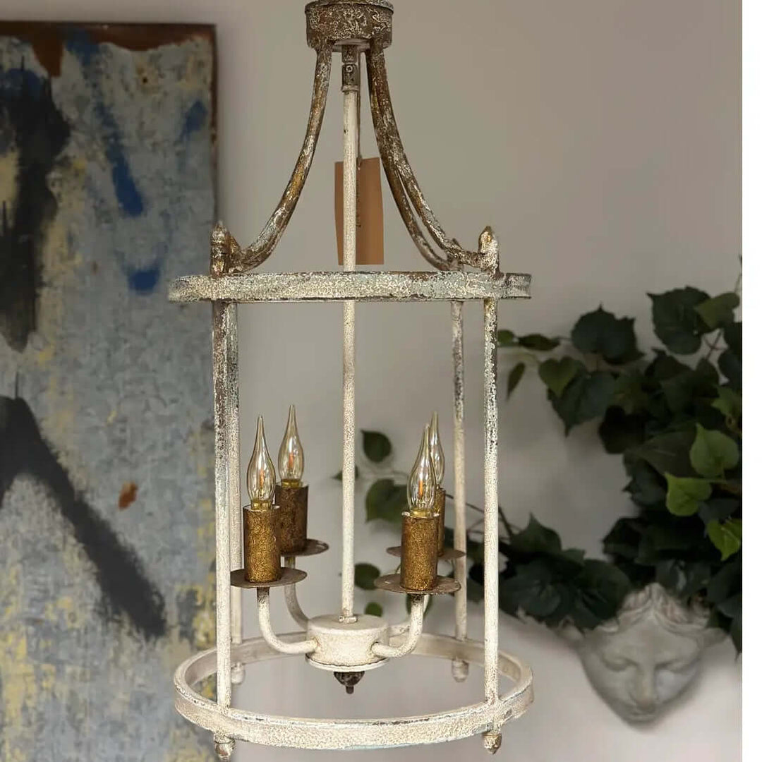 Full round cage pendant with four candle-style light sockets