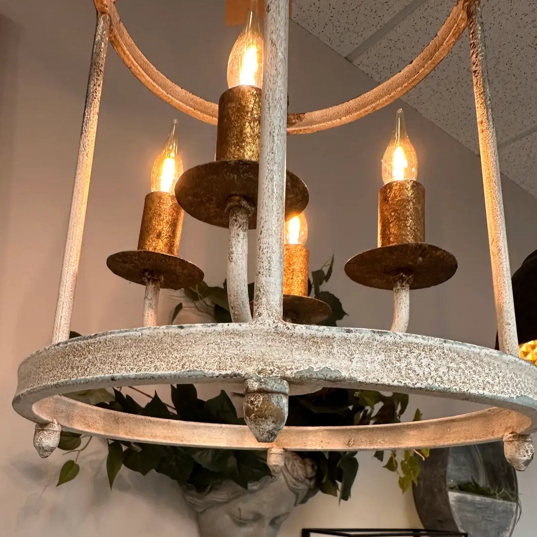 Lower ring and distressed iron finish on the pendant lantern