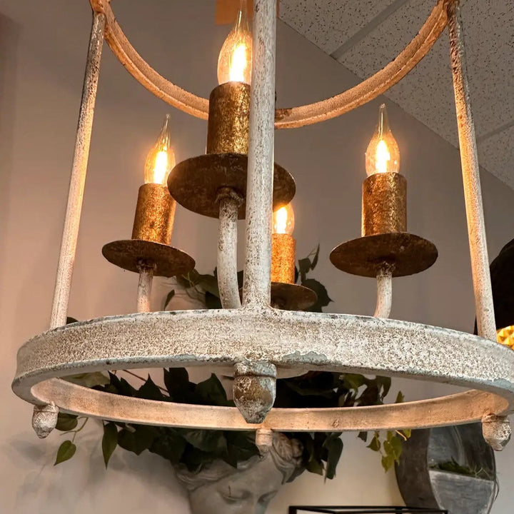 Lower ring and distressed iron finish on the pendant lantern