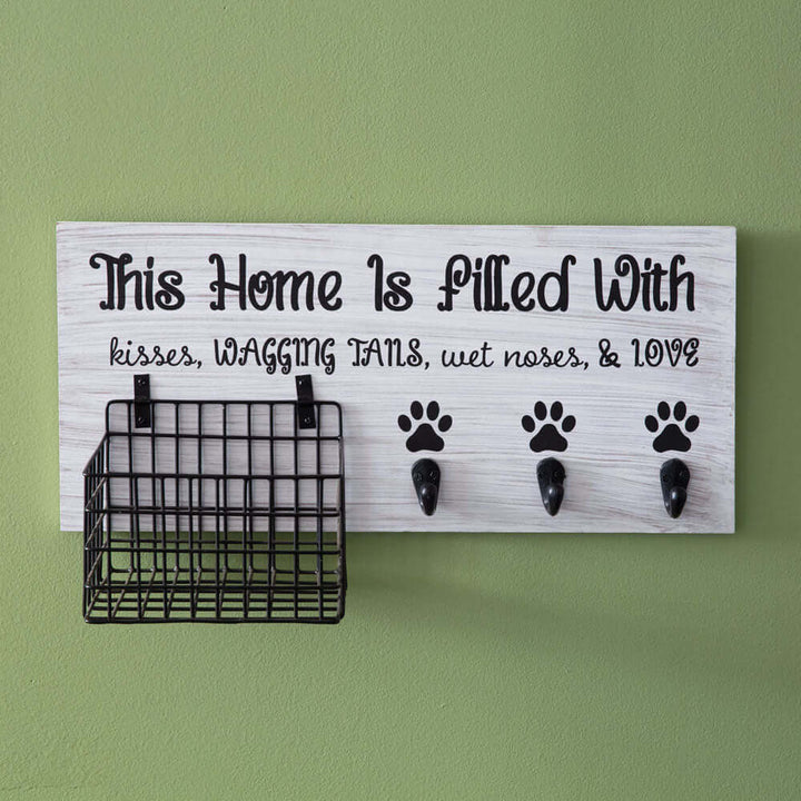 Dog Leash Organizer with Hooks and Basket featuring a sign with the words 'This Home is Filled with Kisses, Wagging Tails, and Love'.
