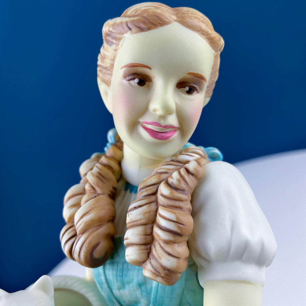 Dorthy in Wizard of Oz with Toto & Snowbabies. Dept. 56 Premiere Edition, Guest Collection collectible porcelain figurine.