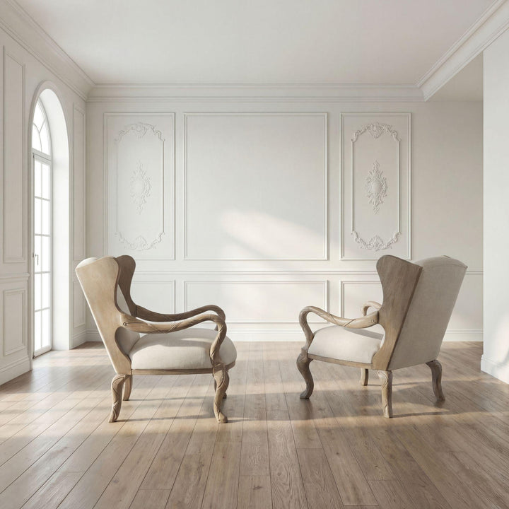 Pair of driftwood ribbon chairs in a pale paneled room; chairs sold individually.