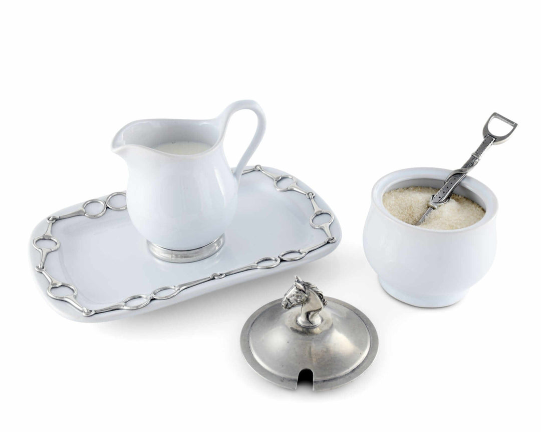Equestrian Sugar and Creamer Set with Pewter Horse Head Details on white background showcasing intricate equestrian-inspired design.