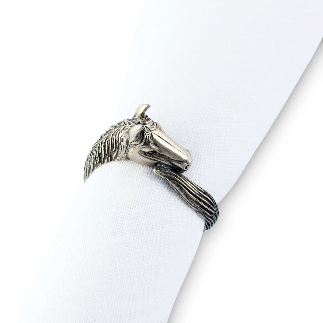 Equestrian Horse Head Pewter Napkin Ring elegantly holding a white napkin, showcasing detailed design for Old World Manor table settings.