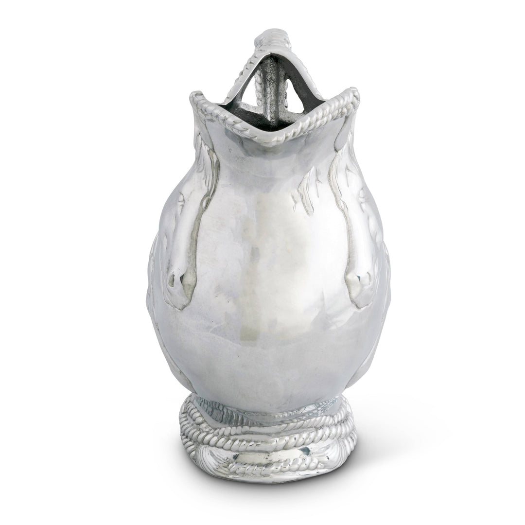 Equestrian Horse and Rope Pitcher depicting mare and foal in sculpted relief, embodying refined Western style on silver vessel