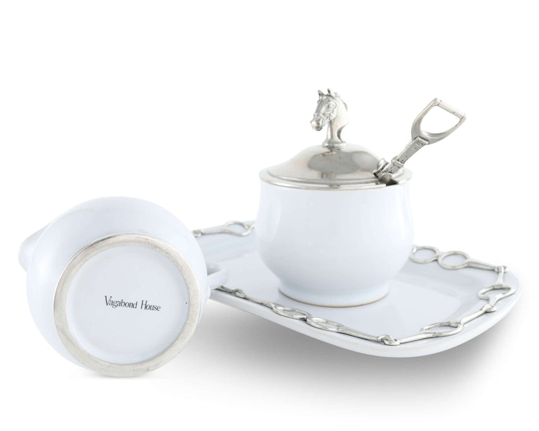 Equestrian Sugar and Creamer Set with Pewter Horse Head Details displayed on a decorative tray