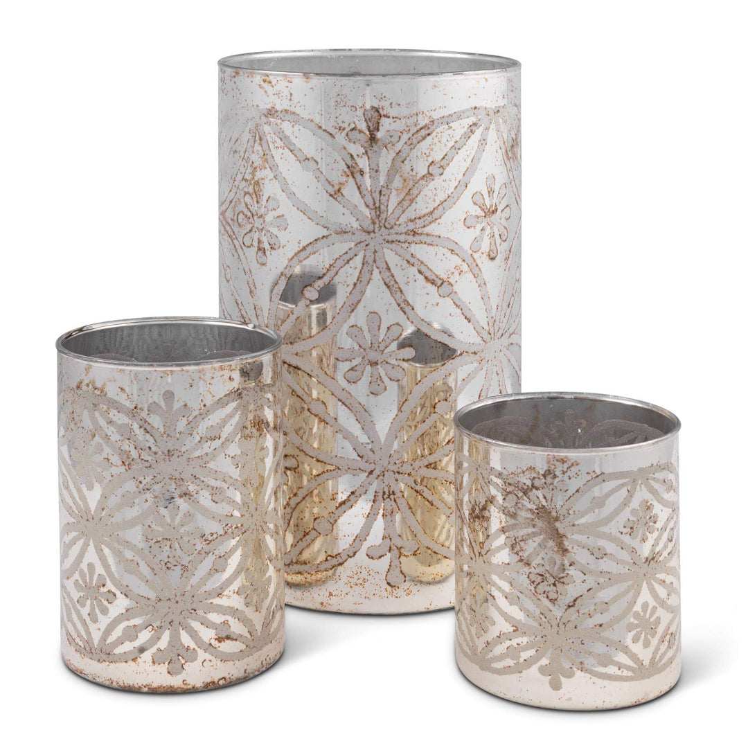 Etched Floral Mercury Glass Candle Holders (Set of 3), three graduated cylinders with etched floral motifs in a mottled silvery mercury finish