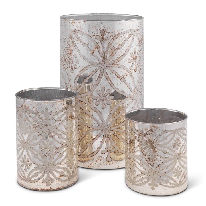 Etched Floral Mercury Glass Candle Holders (Set of 3), three graduated cylinders with etched floral motifs in a mottled silvery mercury finish