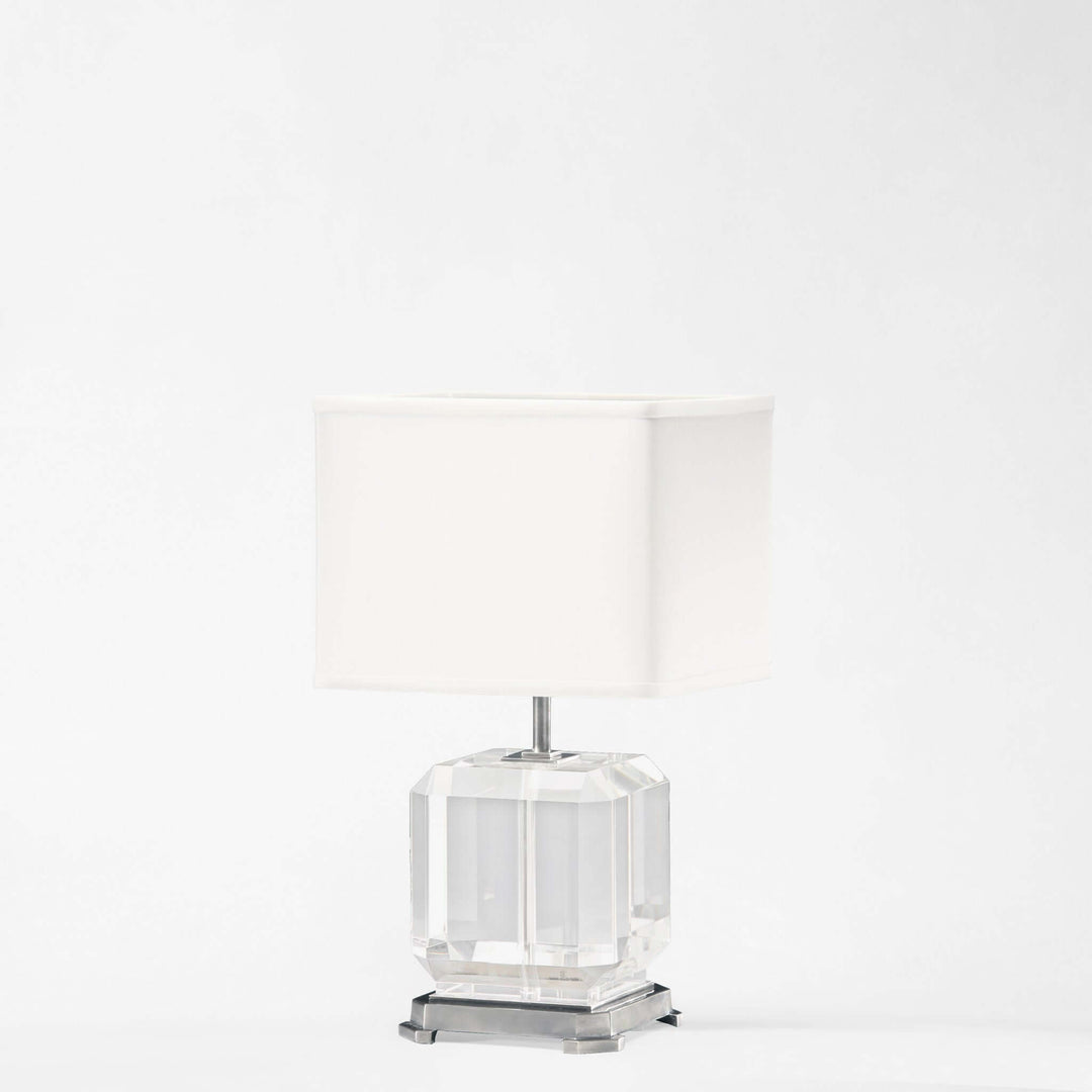 Clear crystal table lamp on a white background