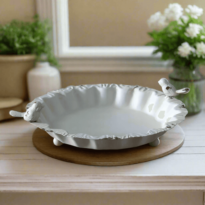 Charming French country decorative bird dish with ruffled edges, metal finish, perfect for farmhouse decor and garden gatherings.