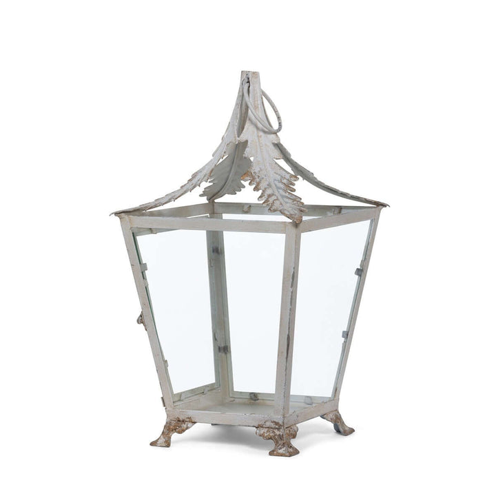 French Country Garden Lantern in distressed cream with iron and glass vintage design, perfect for adding a romantic touch to any space.