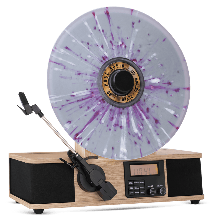 Turntable with a purple and white splatter design on the platter against a white background